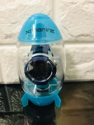 New Xmarine Solar powered Digital Watch! Never needs battery replaced!  Given enough light, they will continually charge and keep going for many years.